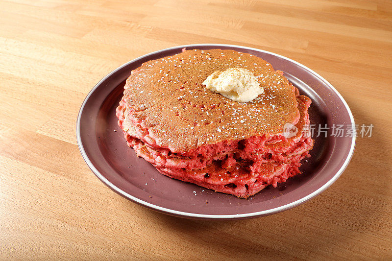 Pancake breakfast dish on wooden table